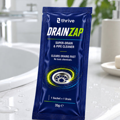 DRAINZAP Sachet 35g on a bathroom bench — one sachet clears one drain